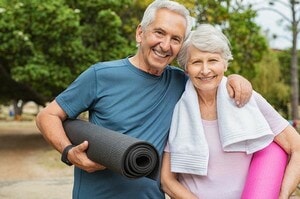 senior-man-and-woman-working-out