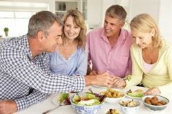 mid-age-couples-enjoying-meal